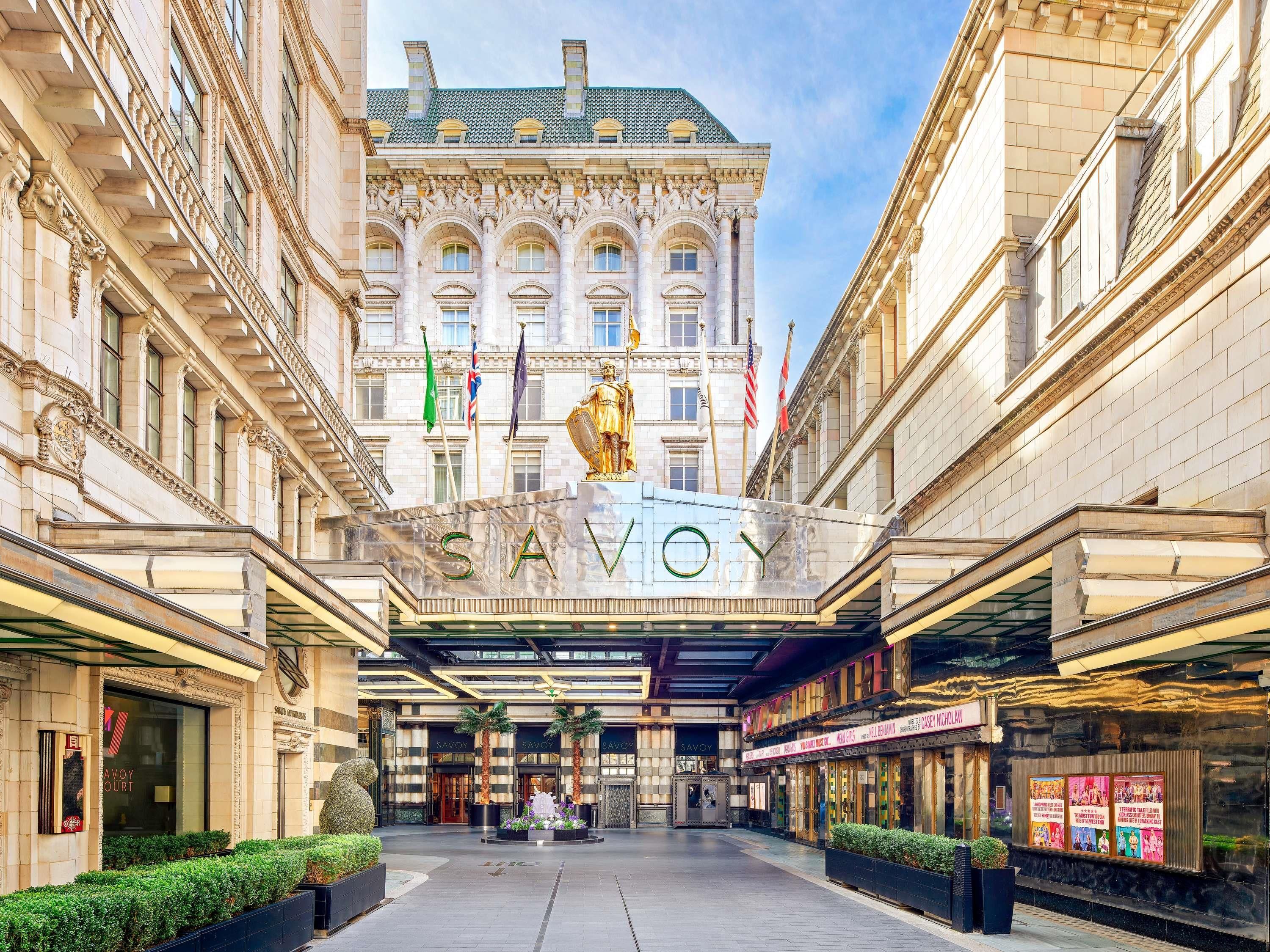 A grand building with a large entrance labeled 'SAVOY.'