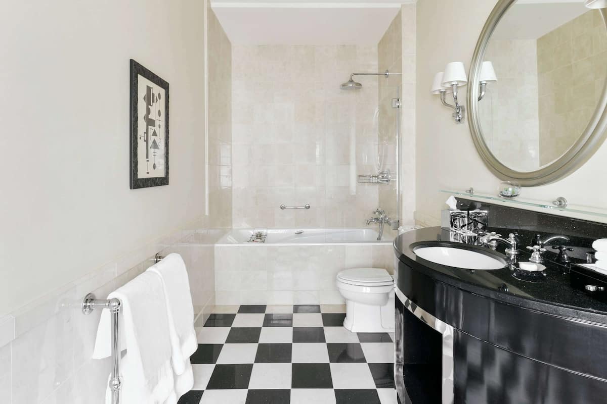 Luxury Double Room, 2 Queen Beds | Bathroom | Combined shower/tub, deep soaking tub, designer toiletries, hair dryer