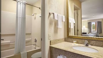 Combined shower/tub, hair dryer, towels, soap