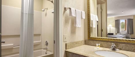 Combined shower/tub, hair dryer, towels, soap