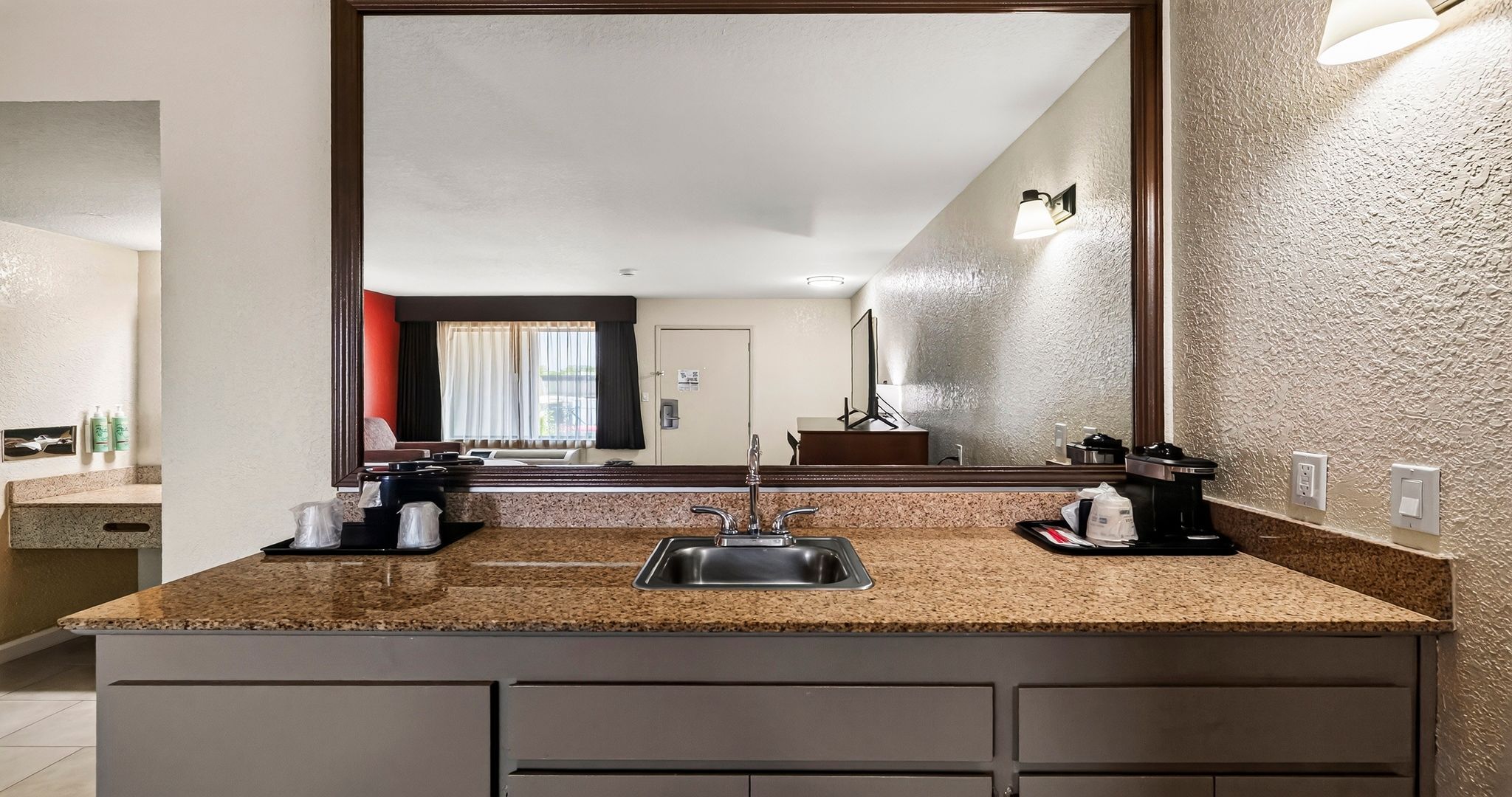 Deluxe Room, 1 King Bed, Non Smoking, Refrigerator & Microwave | In-room safe, desk, laptop workspace, iron/ironing board