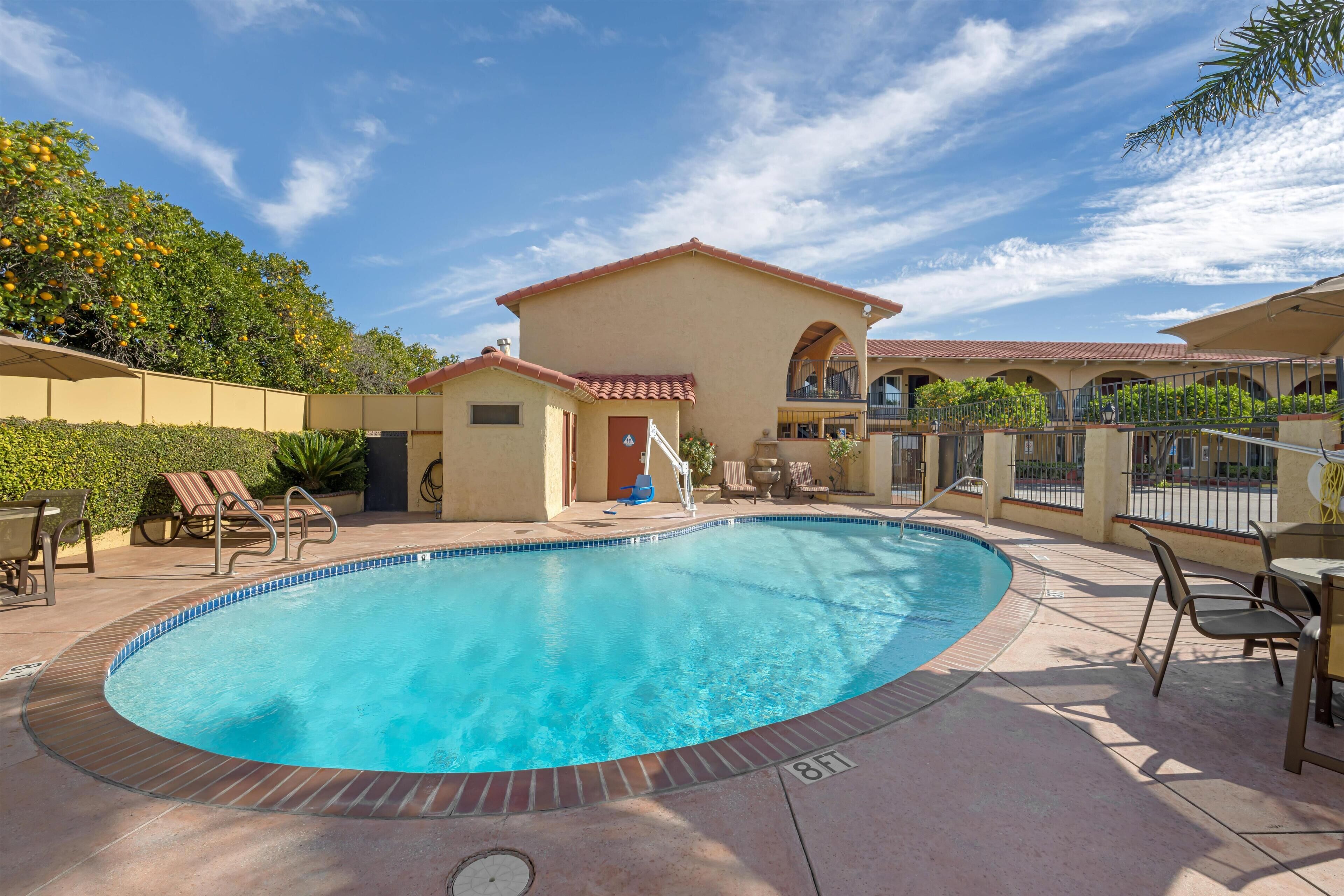 Outdoor pool, open 9:00 AM to 9:00 PM, pool umbrellas, sun loungers