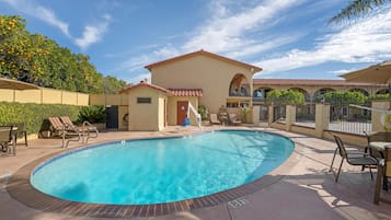 Outdoor pool, open 9:00 AM to 9:00 PM, pool umbrellas, sun loungers