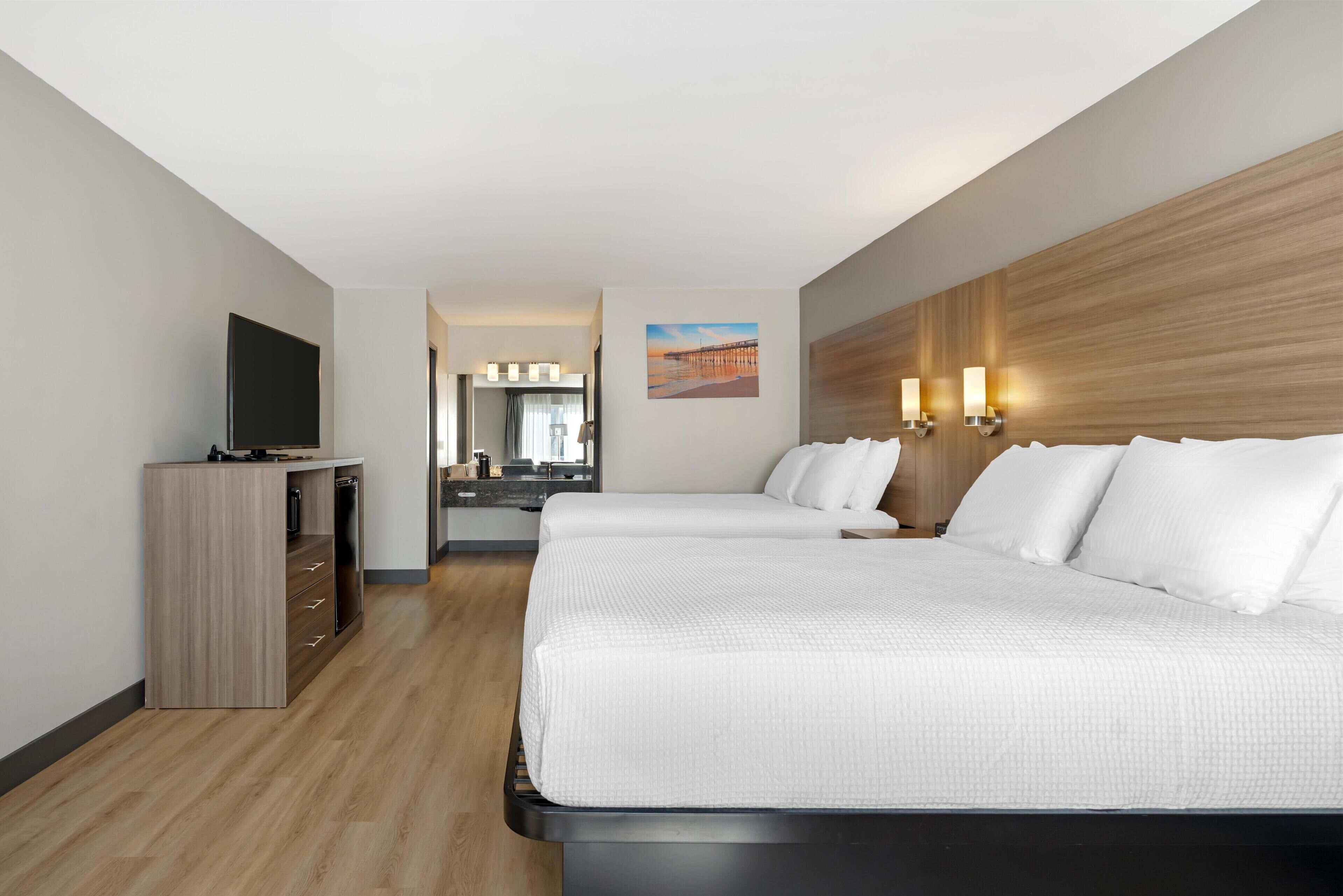 Standard Room, 2 Queen Beds, Non Smoking, Refrigerator & Microwave | Iron/ironing board, free cribs/infant beds, rollaway beds, free WiFi