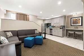 Suite, 1 King Bed, Non Smoking, Kitchen (Living Room;with Sofabed) | In-room safe, desk, laptop workspace, iron/ironing board