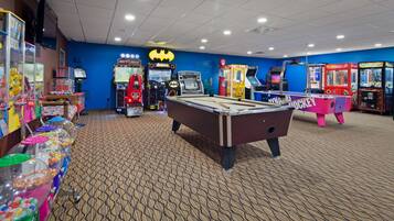 Relax and have fun in our entertainment room, featuring a pool table and a variety of games.