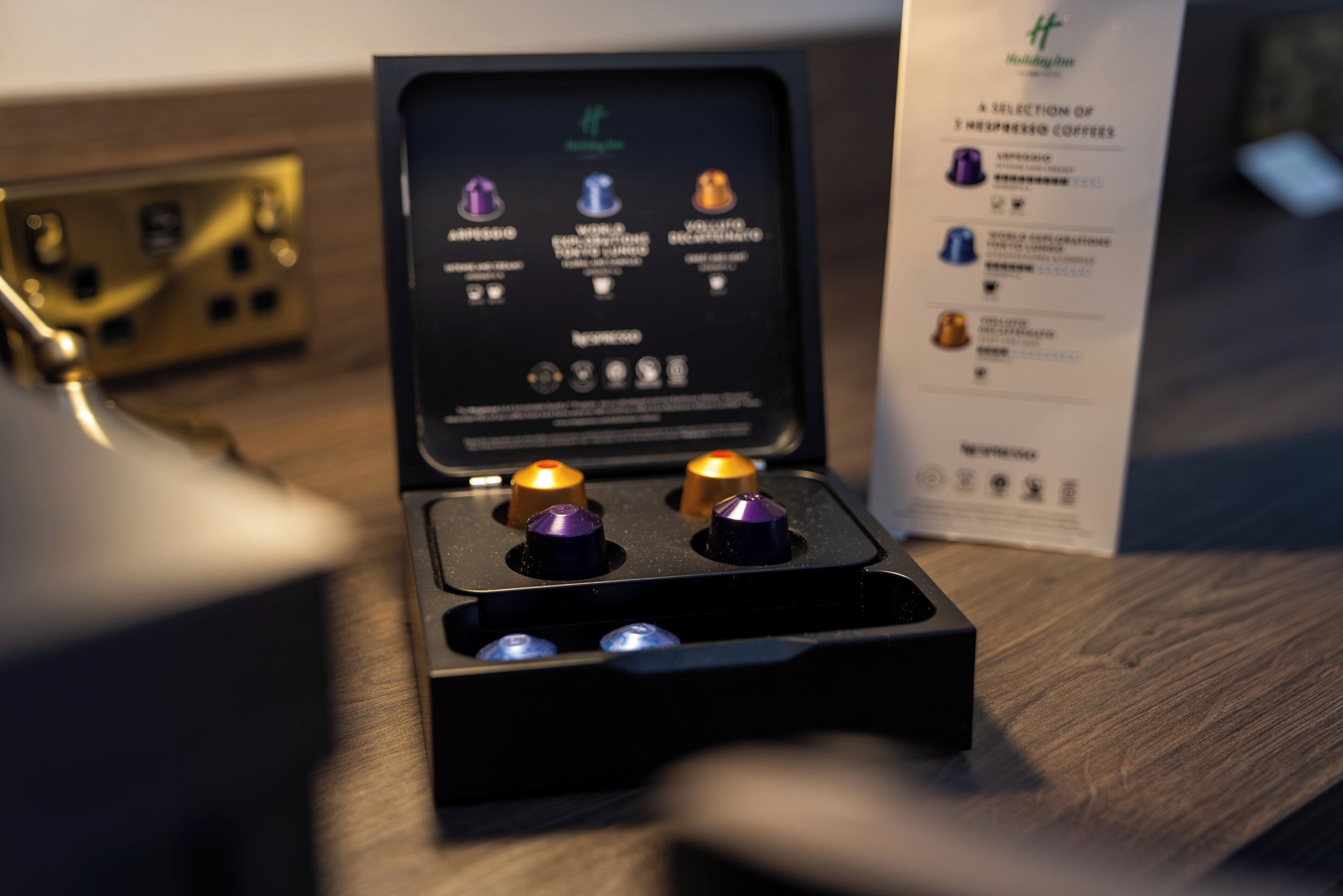 A coffee machine with a selection of espresso options and a coffee pod holder.