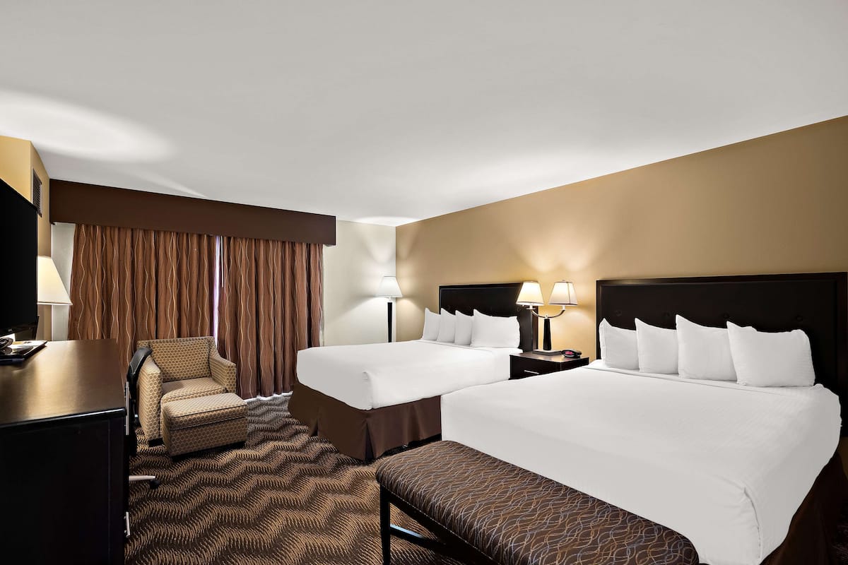 standard room, 2 queen beds, non smoking, refrigerator & microwave | 1 bedroom, desk, laptop workspace, iron/ironing board