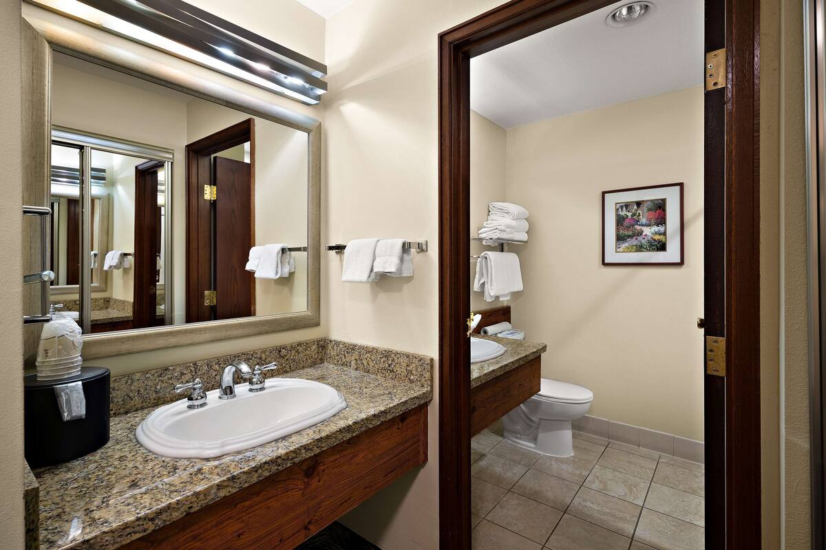suite, multiple beds, non smoking, refrigerator & microwave | bathroom | combined shower/bathtub, free toiletries, hair dryer, towels