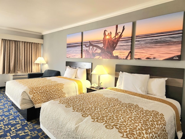 Camas con pillow-top, cortinas blackout y tabla de planchar con plancha