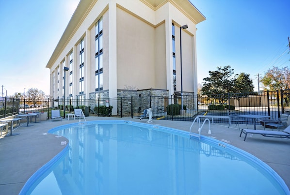 Seasonal outdoor pool, pool loungers