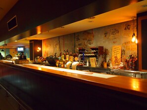3 bars/lounges, piano bar, sports bar