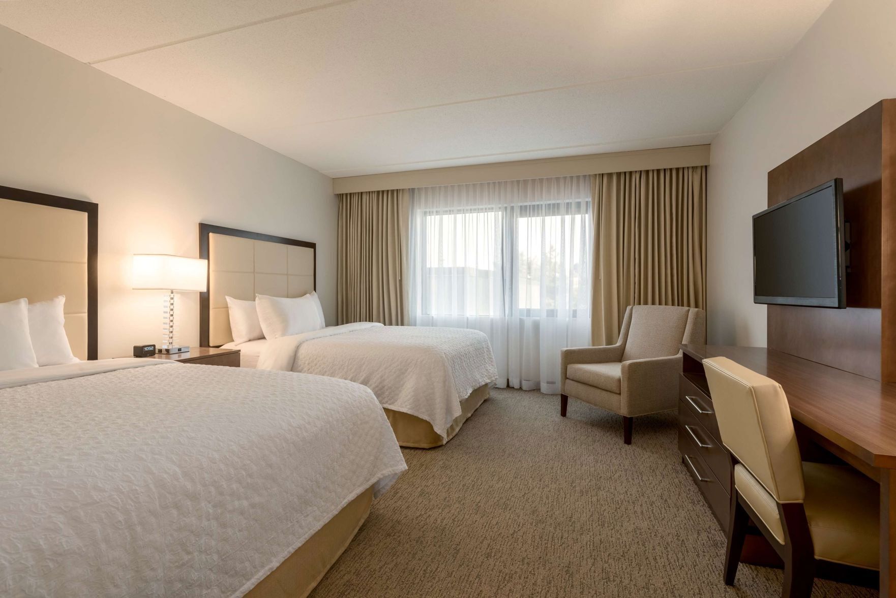 Premium bedding, down comforters, in-room safe, individually decorated