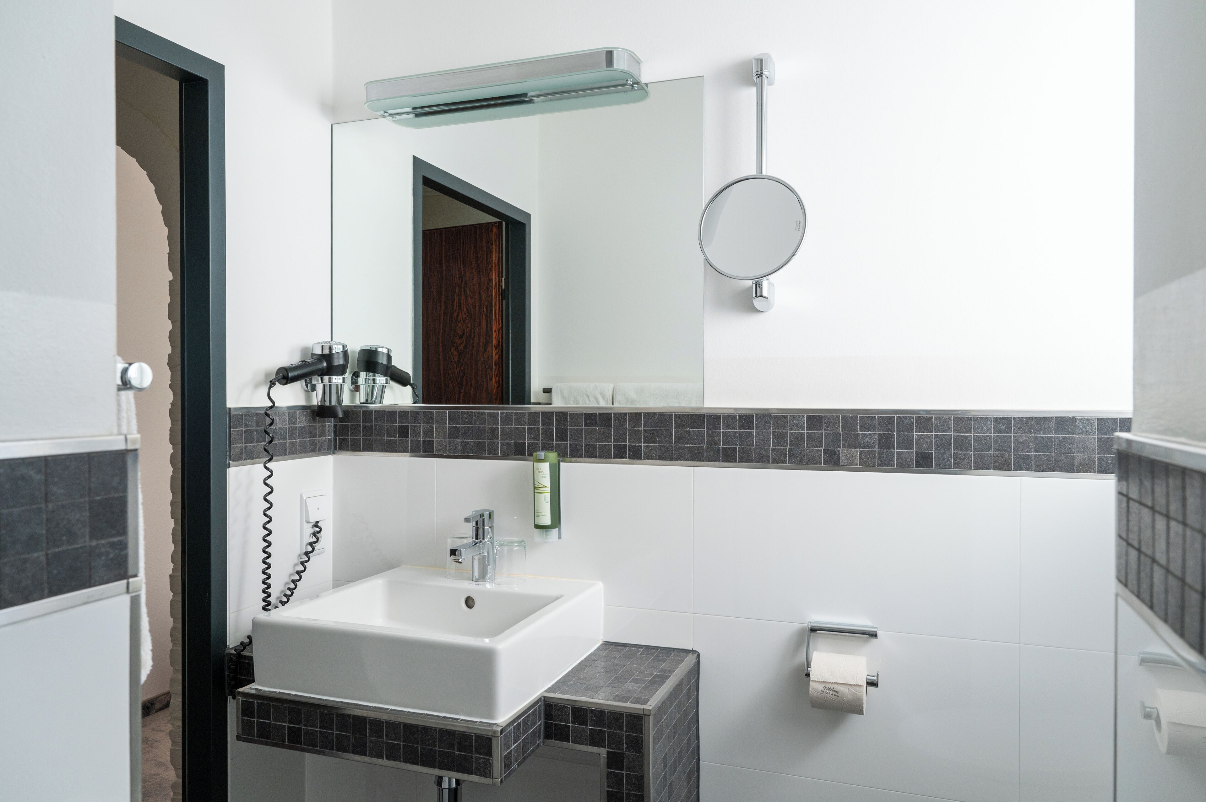 economy double room | bathroom | shower, hair dryer, towels, soap