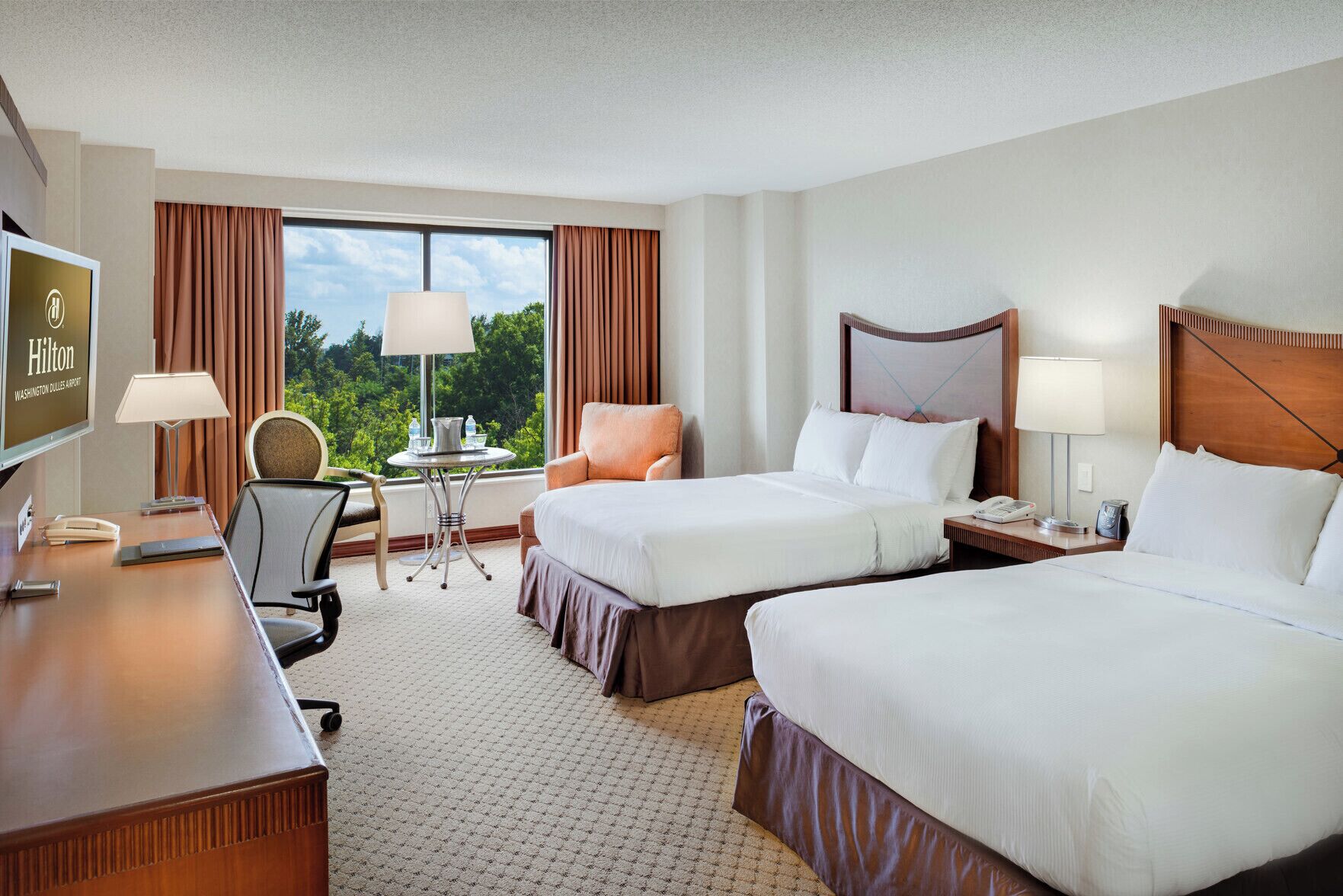 Premium bedding, pillow-top beds, in-room safe, desk