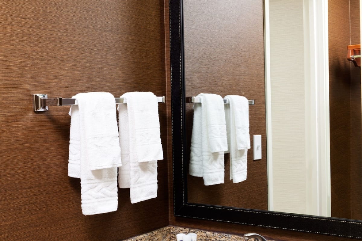 combined shower/bathtub, eco-friendly toiletries, hair dryer, towels