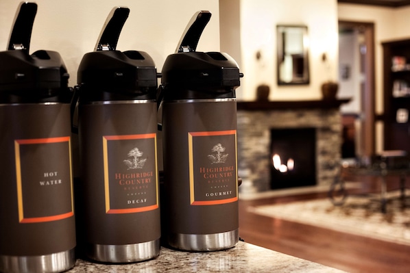 Three insulated water bottles labeled 'Highridge Country Reserve' on a kitchen counter. - Country Inn & Suites by Radisson, Phoenix Airport, AZ (Phoenix)