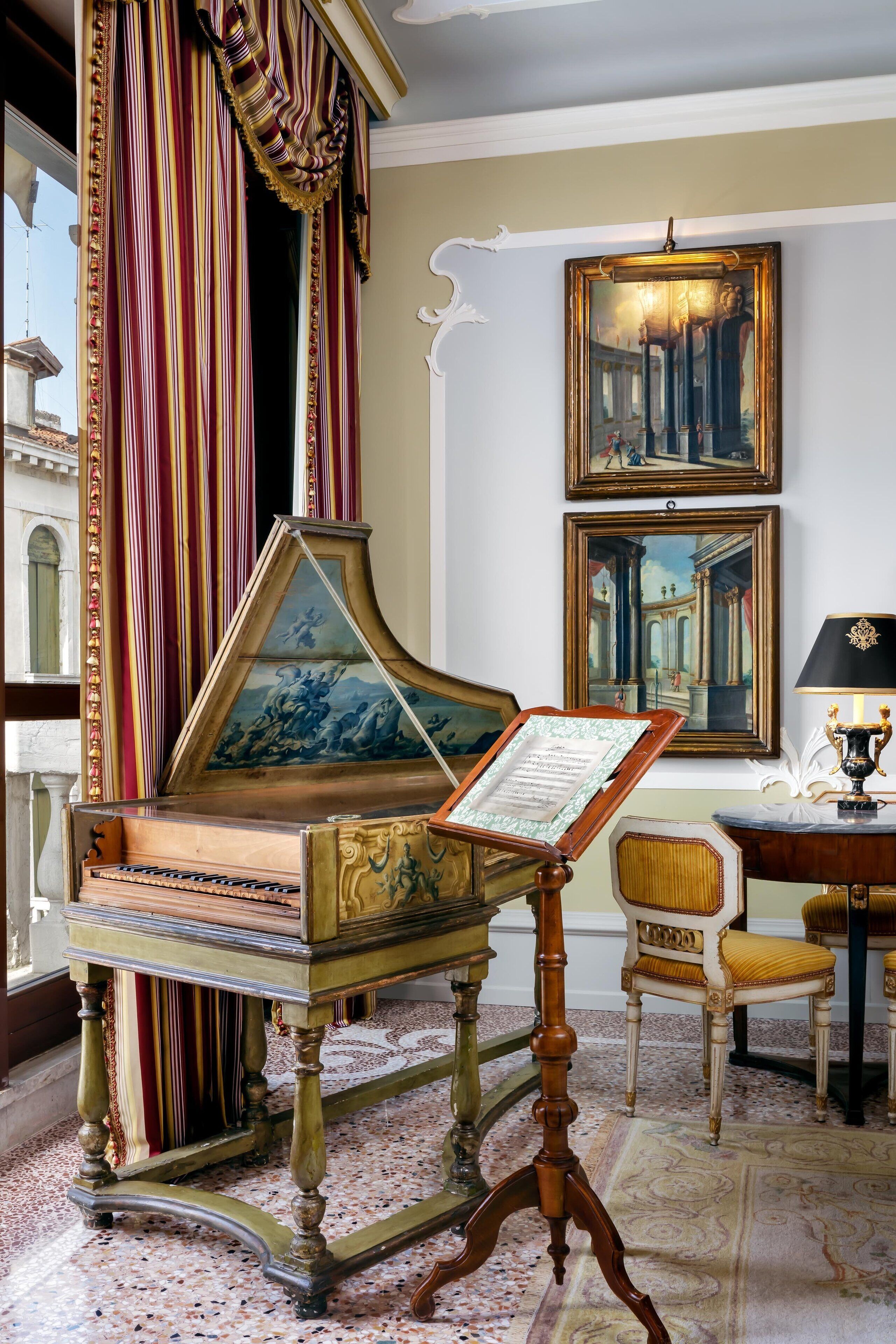 A grand piano with sheet music, a classical painting, and ornate curtains in a well-decorated room.