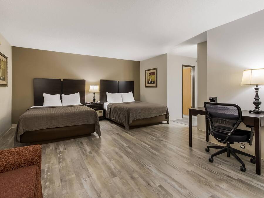 Suite, 2 Queen Beds, Non Smoking | In-room safe, desk, soundproofing, iron/ironing board