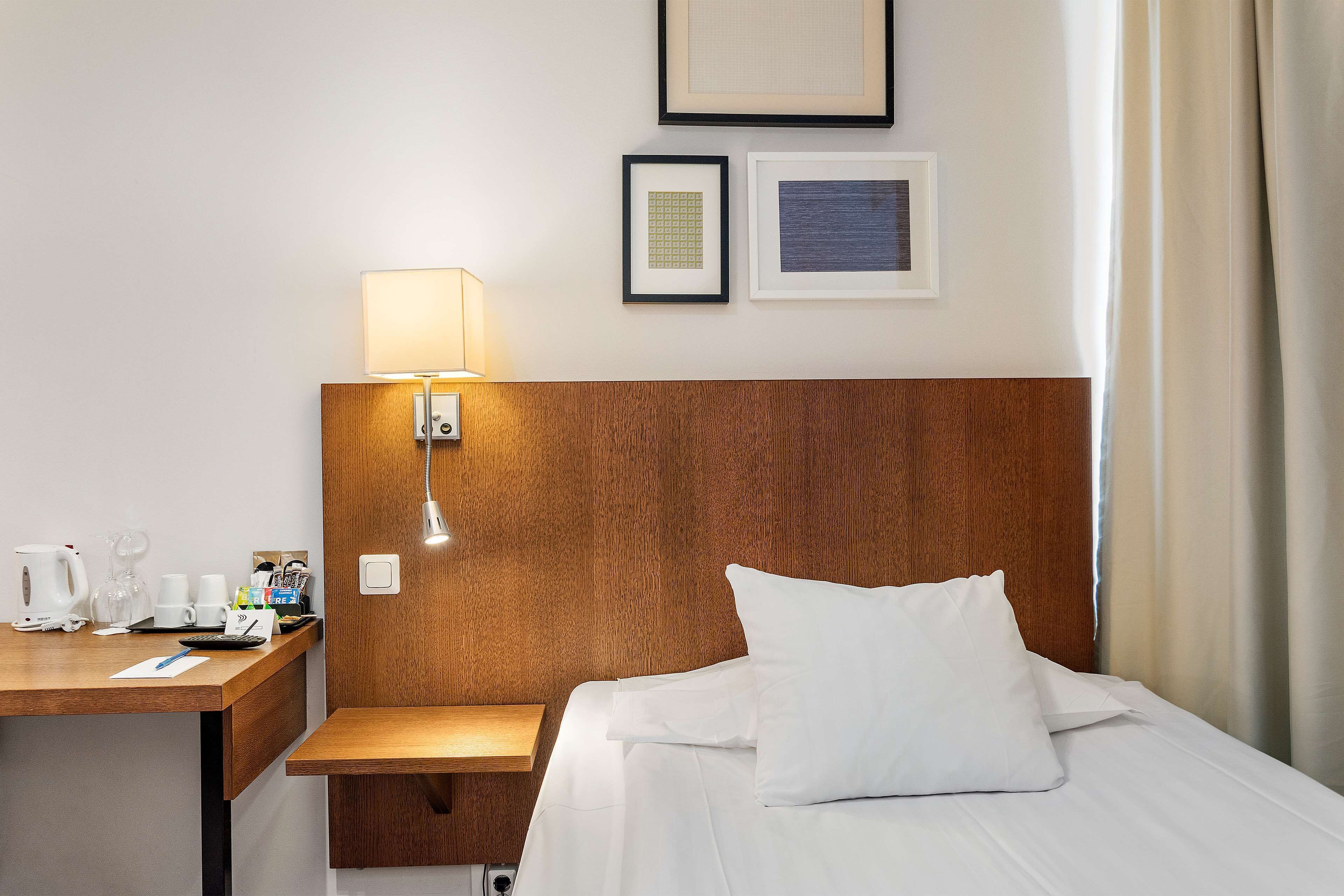 Habitación clásica, 1 cama individual, para no fumadores | Ropa de cama hipoalergénica y caja de seguridad en la habitación 