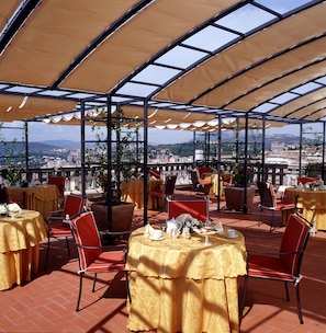 Lunch, dinner served; international cuisine, al fresco dining