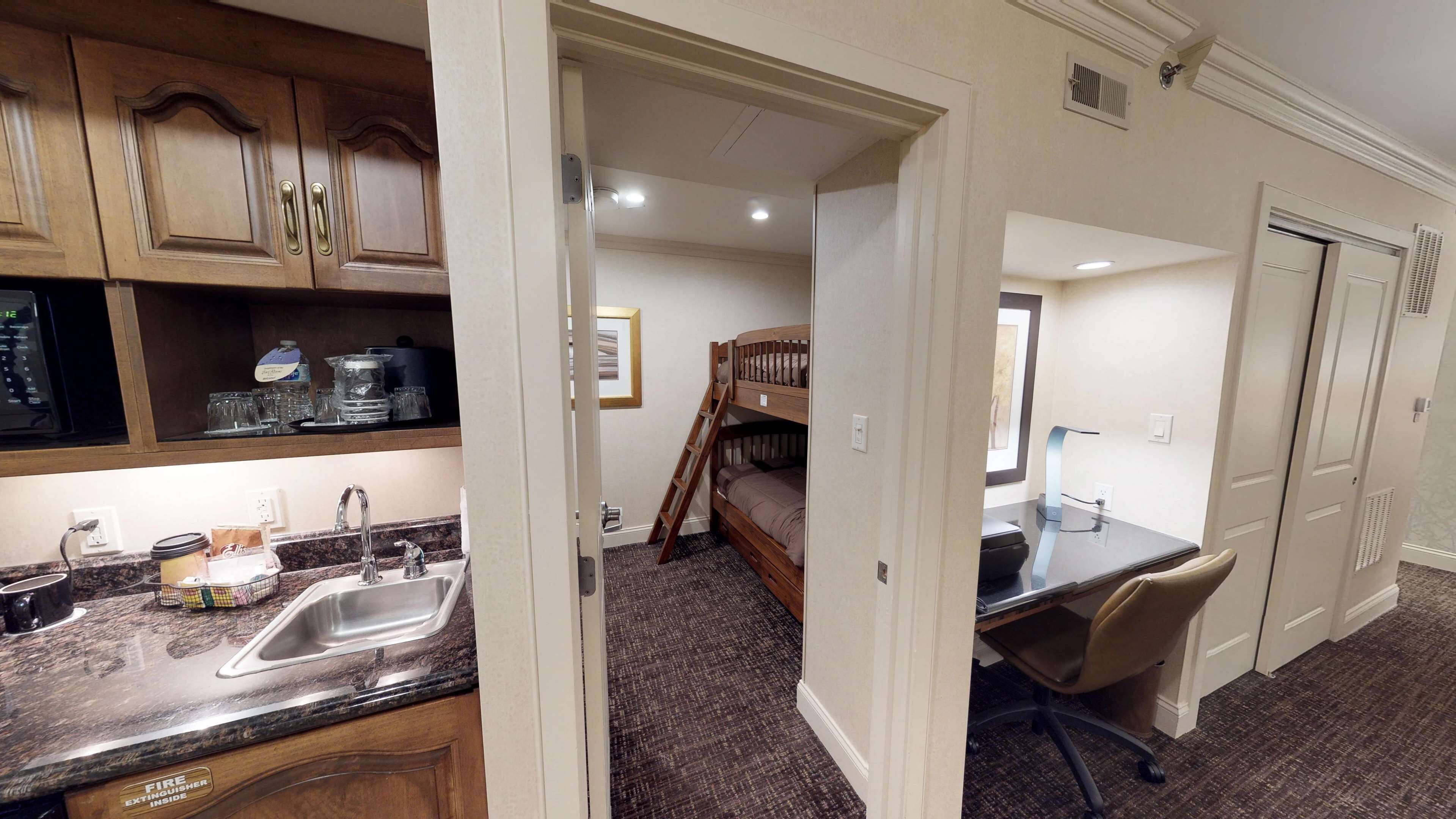 suite, 1 king bed, non smoking, fireplace (bunk beds) | 1 bedroom, in-room safe, desk, blackout curtains