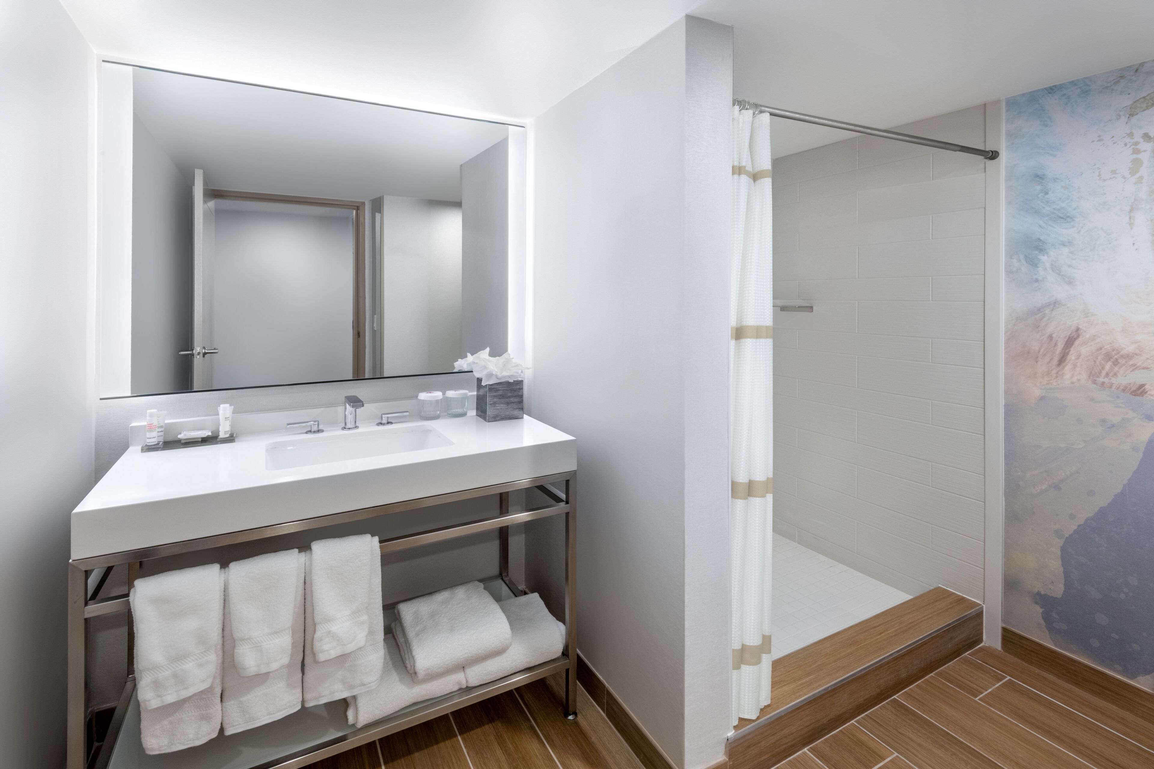 combined shower/bathtub, free toiletries, hair dryer, towels