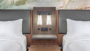 Premium bedding, individually furnished, desk, laptop workspace