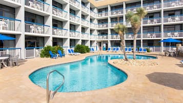 Seasonal outdoor pool, open 8:00 AM to 10:00 PM, pool umbrellas