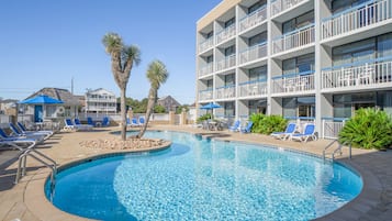 Seasonal outdoor pool, open 8:00 AM to 10:00 PM, pool umbrellas