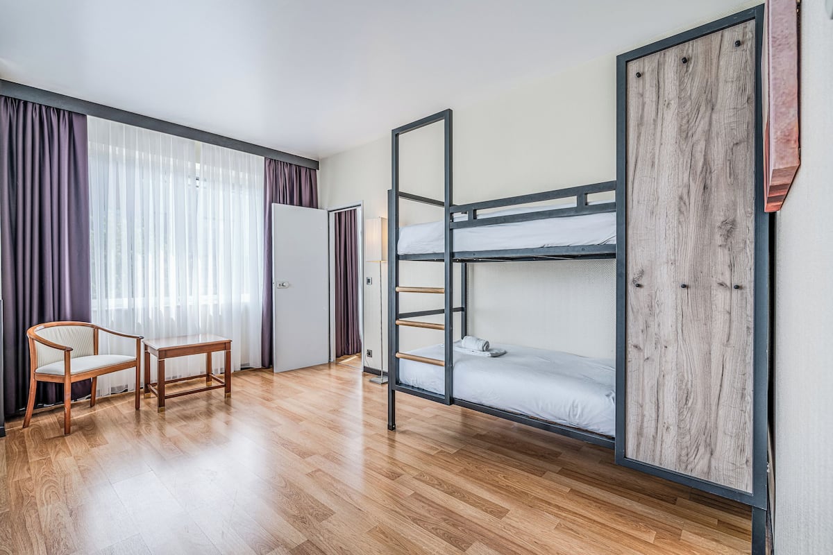 Family Room (2 Adults + 2 Children) | Individually furnished, desk, laptop workspace, blackout drapes