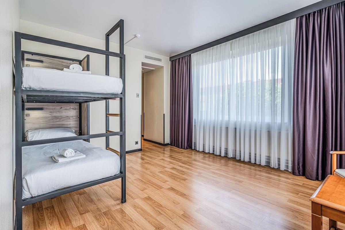 Quadruple Room | Individually furnished, desk, laptop workspace, blackout drapes