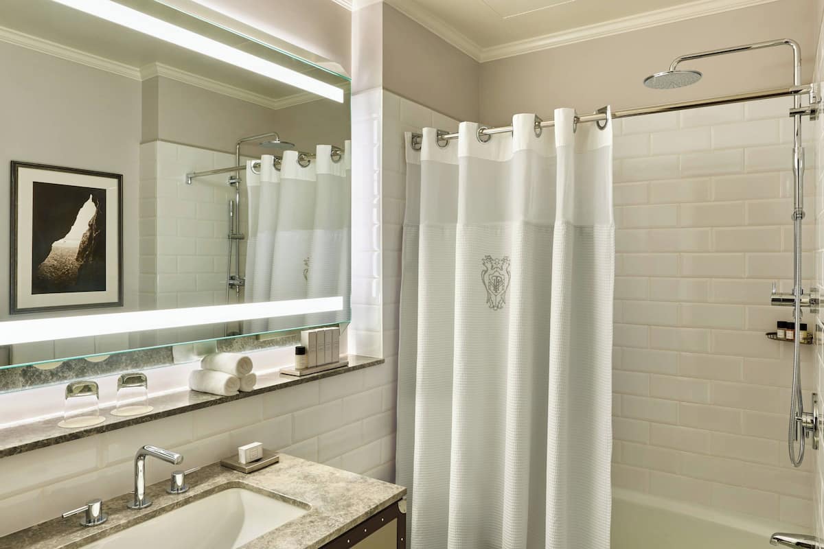 Designer toiletries, hair dryer, bathrobes, slippers