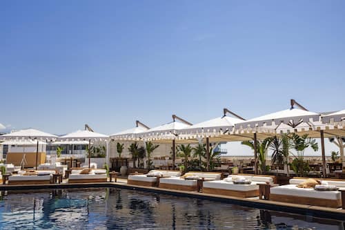 2 outdoor pools, open 9:00 AM to 5:00 PM, pool umbrellas, pool loungers