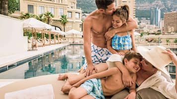 Outdoor pool, open 8:00 AM to 5:00 PM, pool umbrellas, sun loungers
