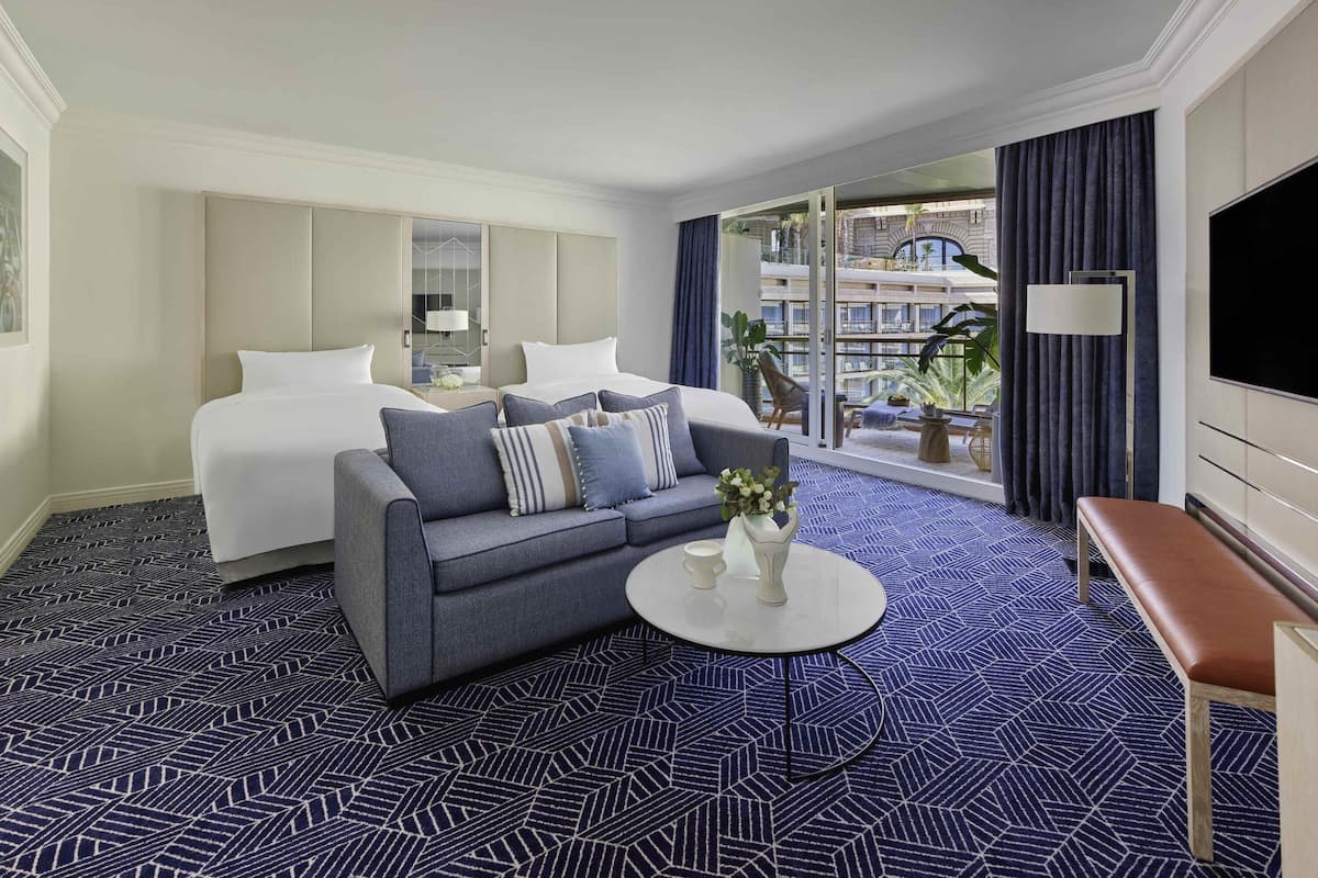 Suíte júnior, 2 camas de casal, vista para o jardim | Roupas de cama premium, frigobar, cofres nos quartos