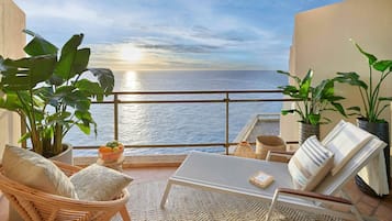 Luxe beddengoed, een minibar, een kluis op de kamer