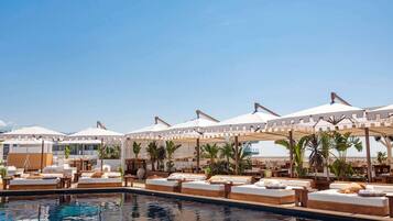 2 outdoor pools, open 9:00 AM to 5:00 PM, pool umbrellas, pool loungers