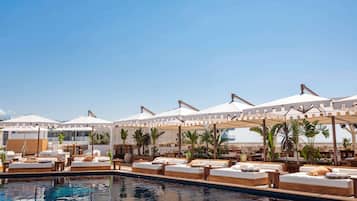 Outdoor pool, open 8:00 AM to 5:00 PM, pool umbrellas, sun loungers