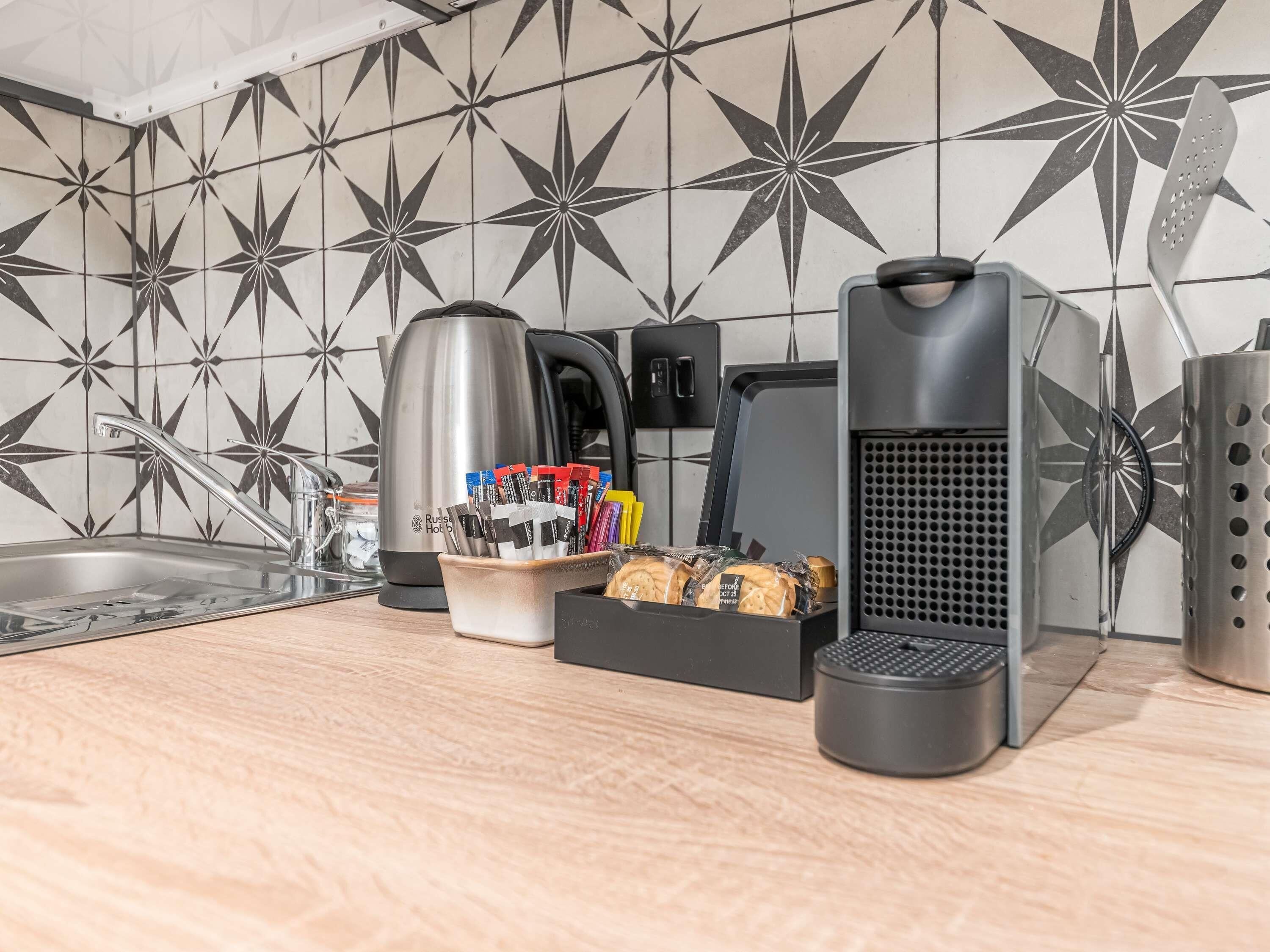 Premium bedding, desk, laptop workspace, blackout curtains