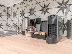 Premium bedding, desk, laptop workspace, blackout curtains