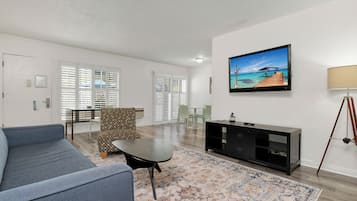 Suite, 1 Bedroom | Living area | 45-inch TV with cable channels, DVD player