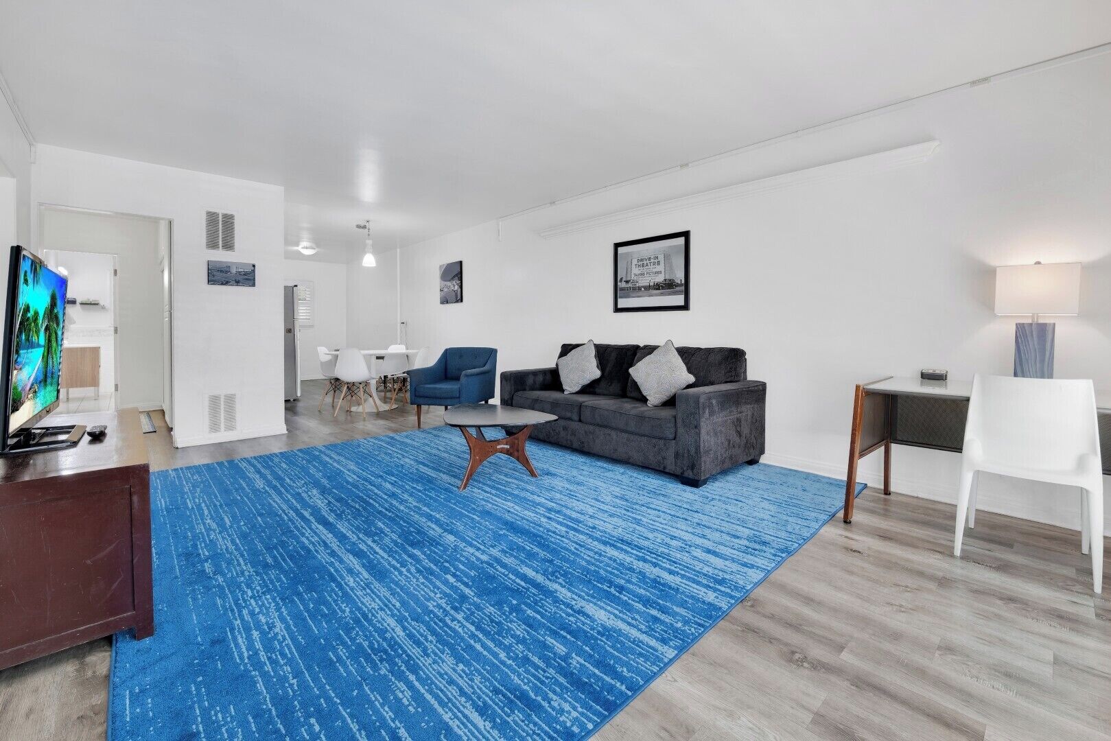 Suite, 2 Bedrooms | Living area | 45-inch TV with cable channels, DVD player