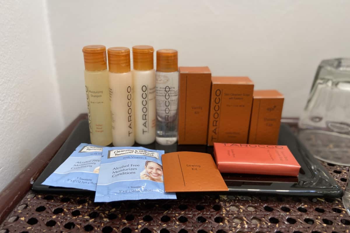 combined shower/bathtub, designer toiletries, hair dryer, bathrobes