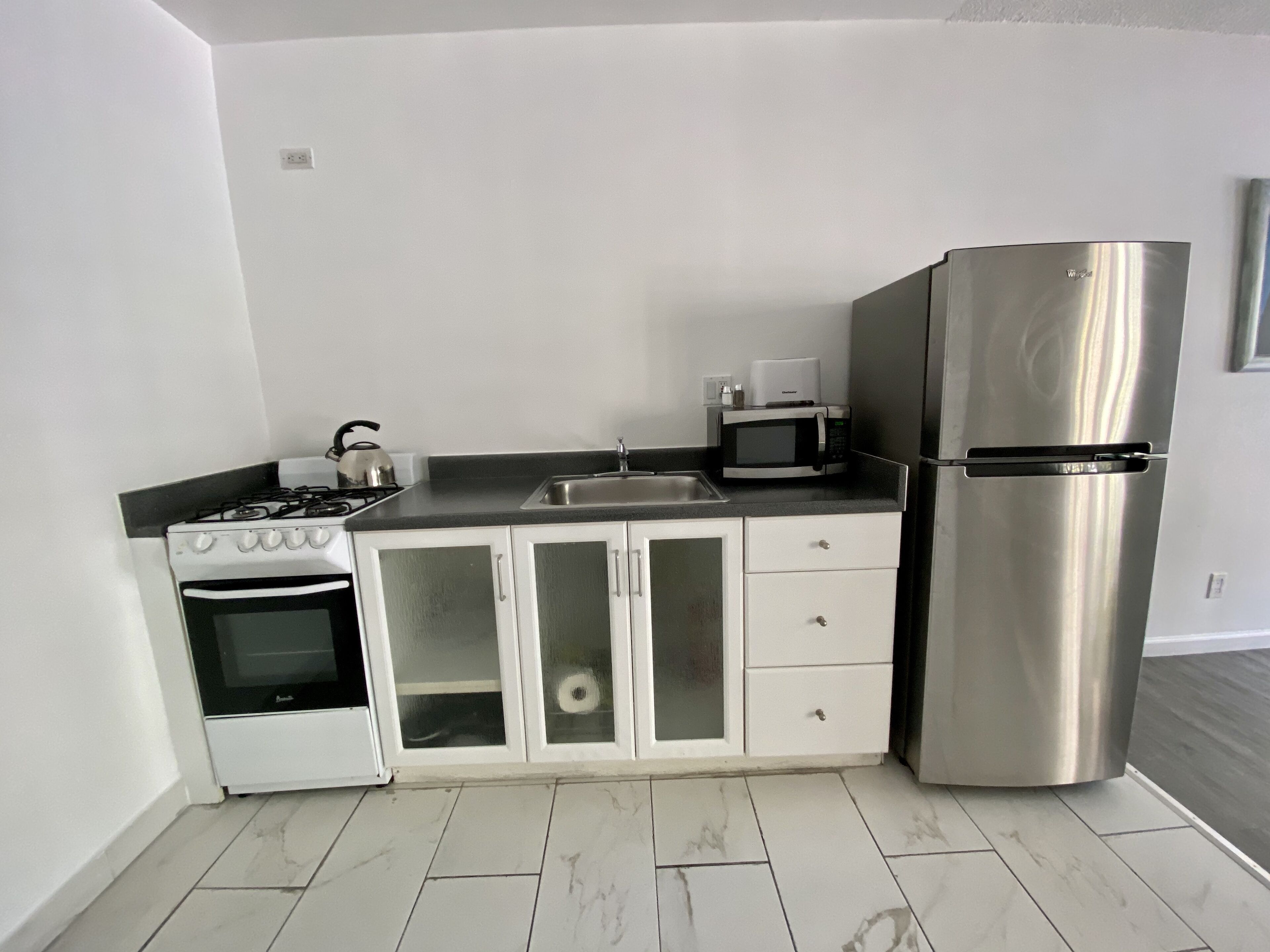 fridge, microwave, coffee/tea maker, paper towels