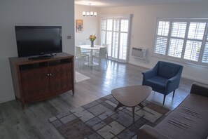45-inch TV with cable channels, DVD player