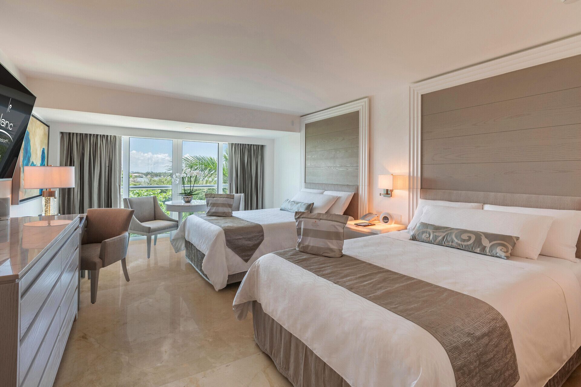 Premium bedding, down comforters, Tempur-Pedic beds, free minibar