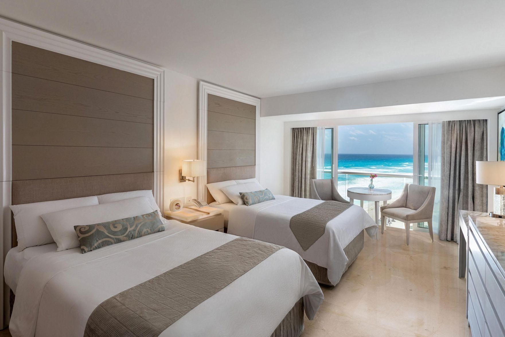 Premium bedding, down comforters, Tempur-Pedic beds, free minibar
