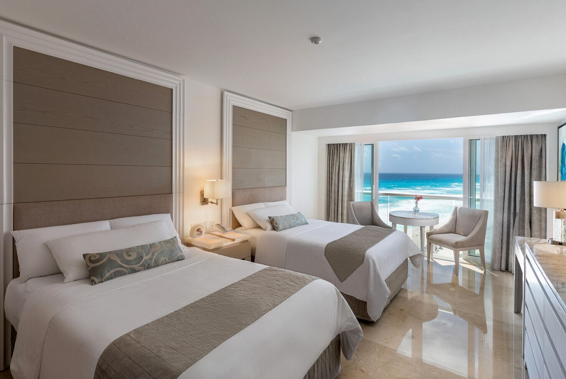 Premium bedding, down comforters, Tempur-Pedic beds, free minibar