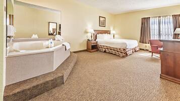 Single King Jacuzzi Suite | Pillow-top beds, desk, iron/ironing board, free WiFi